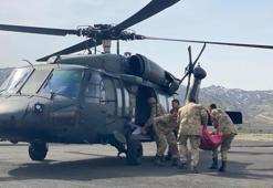 Yolu kardan kapalı köylerde besicilere, helikopterle 1 ton yem