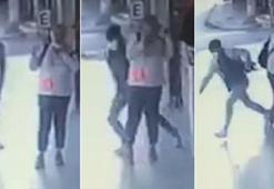 Kadının kulağındaki telefonu çalan kişi tutuklandı; olay anı kameralara yansıdı