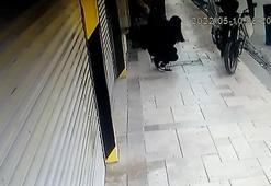 Kaldırımda yürürken başına beton parçası düşen Emine yaralandı