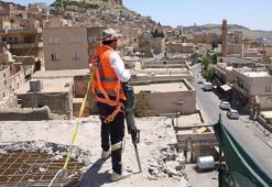 Mardin'de tarihi dokuyu bozan bir bina daha yıkılıyor