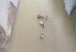 Kahta Çayı'nda baraj kapakları açılınca mahsur kalan 14 kişi kurtarıldı