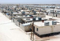 İç savaş mağduru Suriyelilerin 'briket ev' sevinci