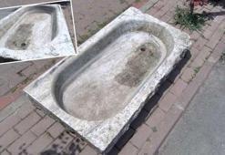 Büyükada'da çaldıkları tarihi üzüm teknesini bahçeye bıraktılar