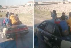 Camları ve plakası olmayan otomobilde tehlikeli yolculuk