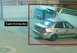 Park halindeki otomobilin camını kırıp telefonu çaldı