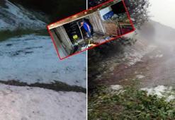 Göynük'te sağanak ve dolu; suya kapılan araçtan 1 kişi kurtarıldı