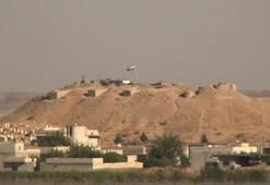 PKK/YPG’li teröristler Ayn El Arap'a rejim bayrağı astı