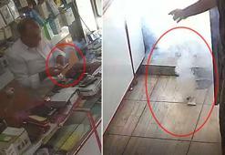 Telefon bataryası elinde patladı; o anlar kamerada