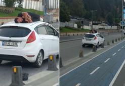 Üsküdar'da ilginç görüntü, otomobilin üzerinde uyudu