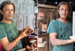 Kültepe'den çıkarılan tabletleri çivi yazısıyla kile işliyor