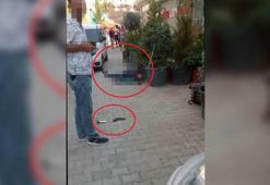 Mühürlenen iş yerinin fotoğraflarını çekerken öldürüldüğü anlar kamerada