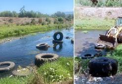 Karaçay Deresi'ni çöplüğe döndüren eski lastikler toplandı