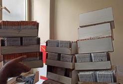 Tavan arasında kaçak sigara ve tütün ele geçirildi; 2 gözaltı