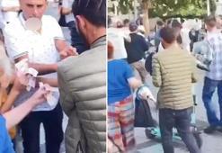 Eminönü'nde paraları havaya saçtı