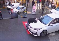 Araç çarpmış gibi kendisini yola bıraktı; o anlar kamerada