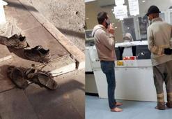 Hastanenin acil girişine çamurlu ayakkabılarını çıkararak girdiler
