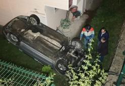 Otomobil, site bahçesinde düştü; anne ile 2 çocuğu yaralı