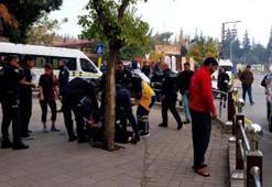 Sokak ortasında tartıştığı eşini bıçakla yaraladı