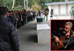 Müzisyen Hakan Yelbiz, toprağa verildi