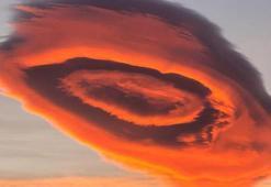 A reddish colored lenticular cloud spotted in Bursa, Turkiye