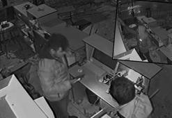 Depremi fırsat bilen hırsızların, cep telefonlarını çalması kamerada