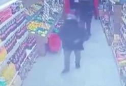 Gaziosmanpaşa'da markette silahlı soygun kamerada