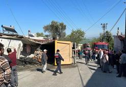 Virajı alamayıp, eve giren hafriyat kamyonunun sürücüsü ağır yaralandı