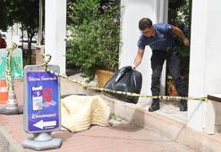 Antalya'da sokak ortasındaki cesedin üzerine yorgan, çevresine dubalar konuldu