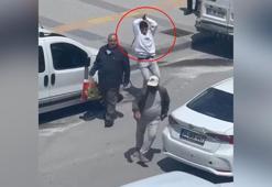 Kaçmaya çalışan cinayet şüphelisinin başına demir çubukla vurdu