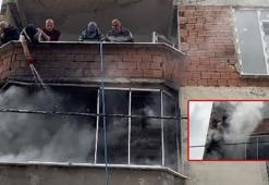 Arnavutköy'de 4 katlı binada yangın: Hortum ve kovalarla su taşıyarak söndürmeye çalıştılar