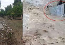 Çorum’da dağdan gelen sel suları parke taşlarını söktü, çöp konteynerlerini sürükledi