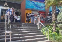 Kafede tartıştığı kişiyi bacağından vurdu