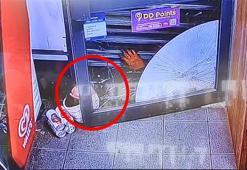 İngiltere’de soyguncu, kaçarken marketin kepenginin altına sıkıştı