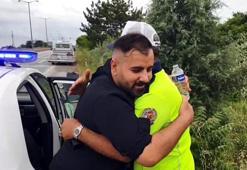 Takla atan otomobilden kurtaran polislere, sarılarak teşekkür etti