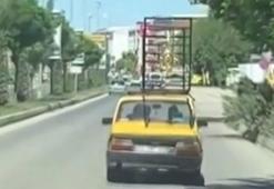 Otomobilin üzerinde demir korkuluk taşıdı; o anlar kamerada