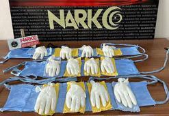 Bel ve bacaklarına sardığı bezlerden uyuşturucu çıktı