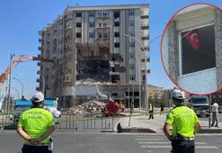 Polis uyardı; ağır hasarlı binanın yıkımı Türk bayrağı için durduruldu