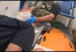 Ukrayna’da bombardımanda yaralanan kurtarma görevlisi hastaneye böyle götürüldü