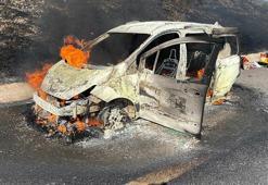 Manisa'da, otomobilde çıkan yangın ormana sıçradı