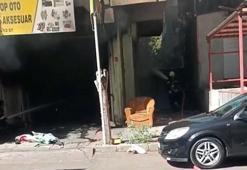 Oto aksesuarcıda otomobilin yakıt deposu alev aldı: 2 yaralı