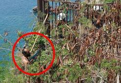 Polise zor anlar yaşattı, üstüne çıktığı şemsiye tentesi yırtılınca yakalandı