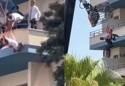 Sepeti kırılan vinçten düşen işçiler, emniyet kemeri sayesinde hayatta kaldı