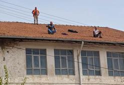 İşten çıkarılan madencilerden çatıda eylem