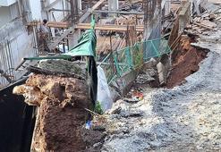 İstinat duvarının çökmesi sonrası yolda kırılmalar oldu; inşaat alanı kaydı