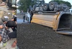 Pendik'te şoförünün direksiyon hakimiyetini kaybettiği kamyon caddeden alt yola düştü