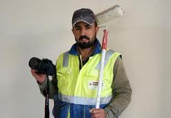İnşaat işçisi doğa fotoğrafçısı