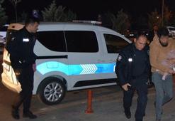 Eşini bıçaklayan koca kucağında bebeğiyle gözaltına alındı