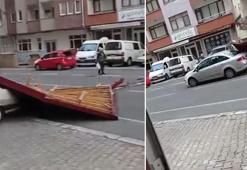 Trabzon'da fırtınada uçan çatının altında kalmaktan son anda kurtuldu, olay anı kamerada