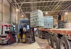 Filistin Kızılayı, insani yardım yüklü 80 kamyonu teslim aldı