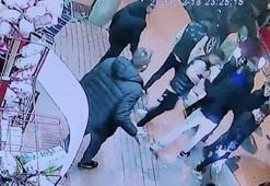 Silahlı gruptan kaçıp markete sığınan 3 kişiyi, iş yeri sahibi kurtardı; olay anı kamerada